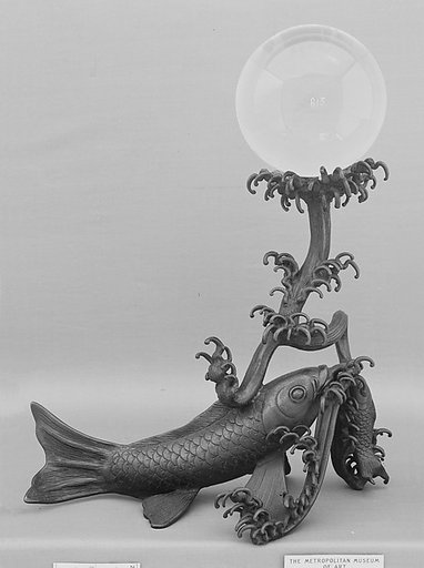 Crystal Ball on a Bronze Stand in the Shape of a Fish