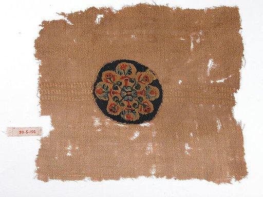 Fragment with a Composite Floral Motif Roundel