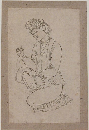 Young Man Sewing