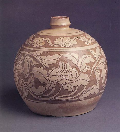 Bottle decorated with peonies