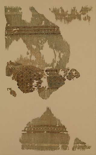 Portion of a Garment with Geometric Patterns