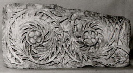 Fragment of a Frieze with Scrolls Enclosing a Rosette and a Cross
