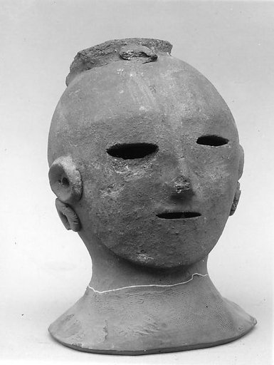 Head of a Female Haniwa Figure with Headdress and Earrings