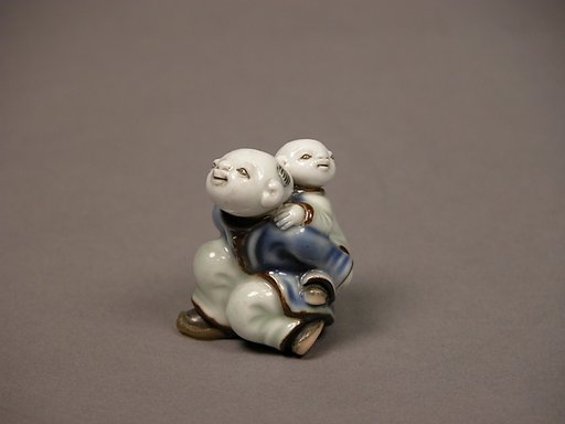 Child Carrying an Infant Netsuke