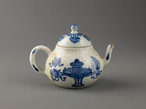 Small covered wine pot or teapot