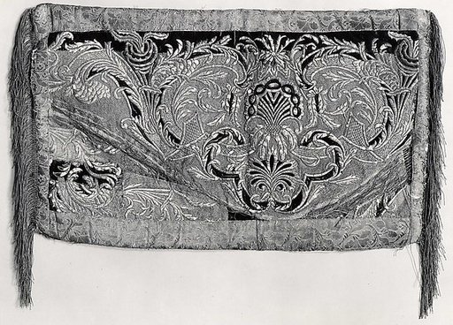 Part of a cope (?) made into a cushion