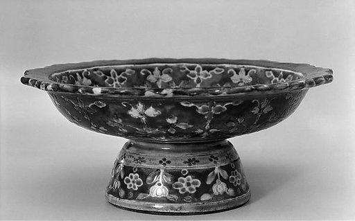 Footed dish with floral pattern