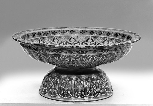 Footed dish with floral pattern