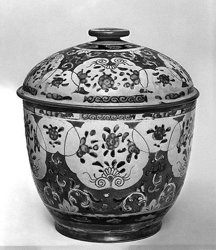 Covered bowl with floral pattern