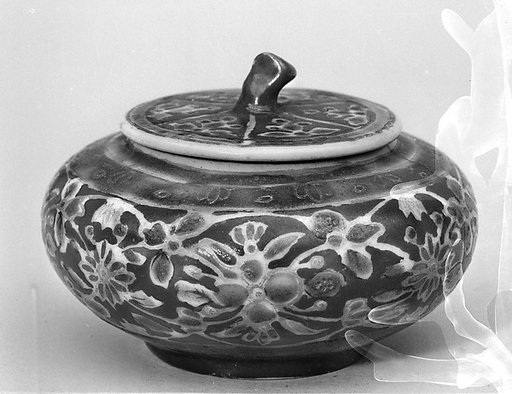 Covered jar with floral pattern