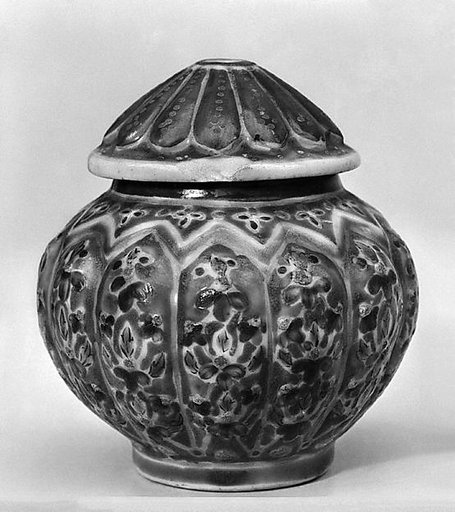 Covered jar with floral pattern