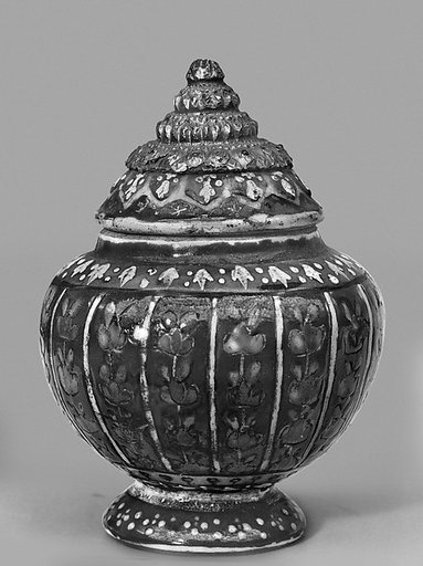 Covered bowl with floral pattern