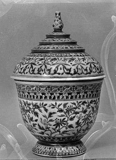 Covered bowl with floral pattern