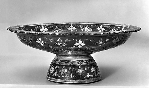Footed dish with floral pattern
