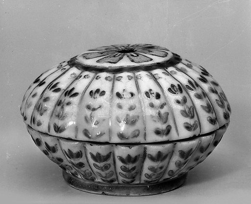 Covered box with floral pattern
