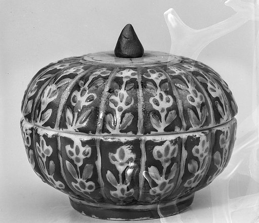 Covered box with floral pattern