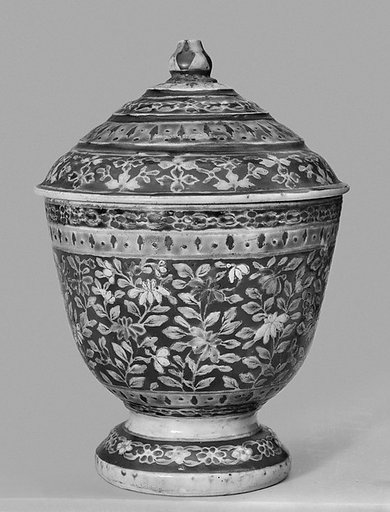 Covered bowl with floral patterns