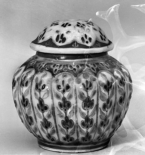 Covered jar with floral patterns