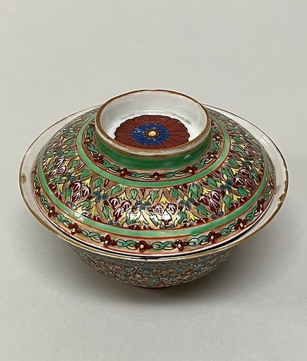 Covered bowl with floral pattern