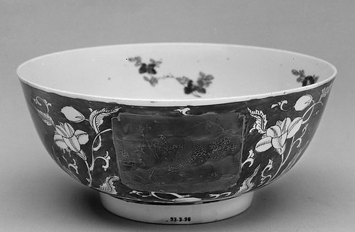 Bowl with landscape over a floral ground