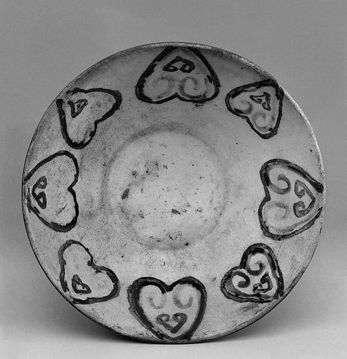 Bowl with stylized clouds