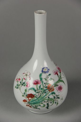 Vase with butterflies and flowers