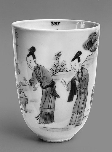 Cup with ladies in a garden