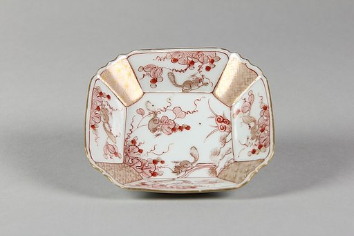 Saucer with squarrels and grape vines