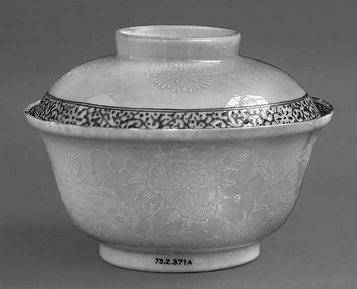 Covered cup with flowers