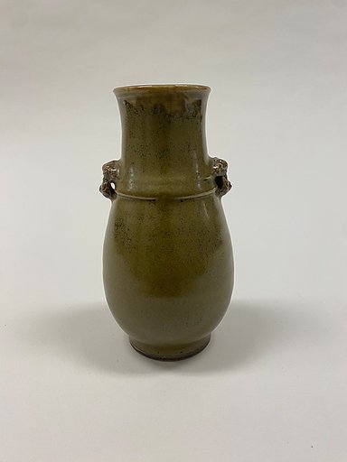Vase with animal masks