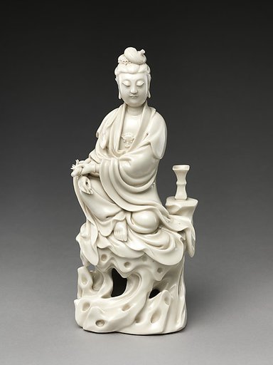 Bodhisattva Guanyin seated on a rock