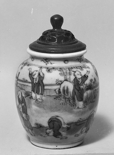 Miniature jar with children at play