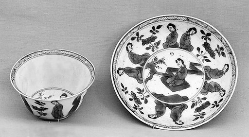 Cup and saucer with ladies