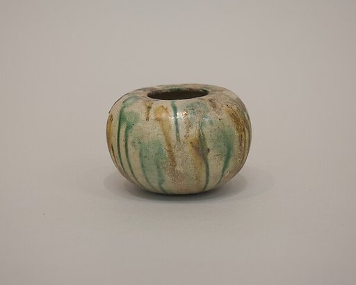 Miniature alms bowl