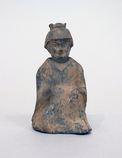 Figure of a seated man