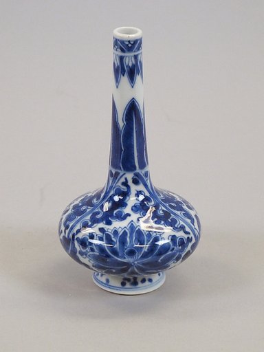 Bottle with floral scrolls