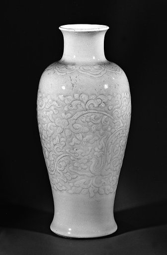 Vase with dragon amid floral scrolls