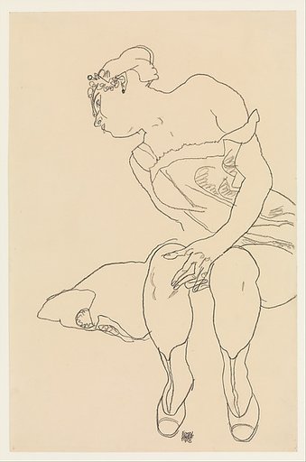 Seated Woman in Corset and Boots