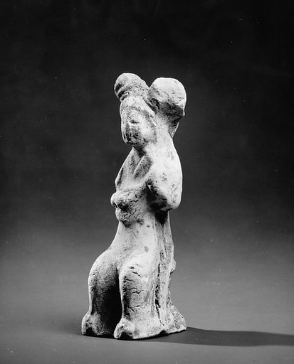 Seated female musician with lute