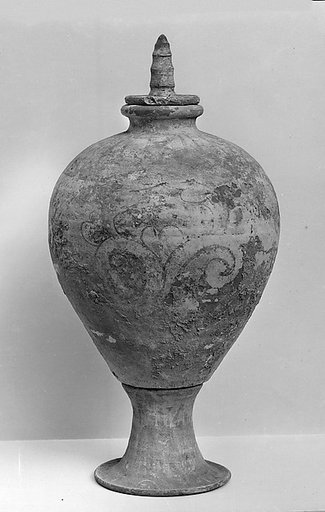 Covered jar on stand