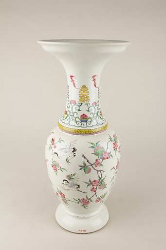 Vase with cranes and peaches