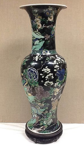 Vase with flowers and birds