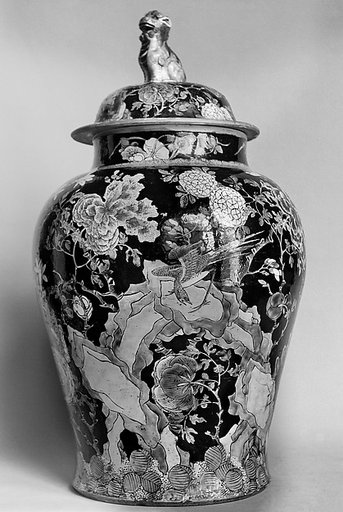 Covered jar with birds and flowers