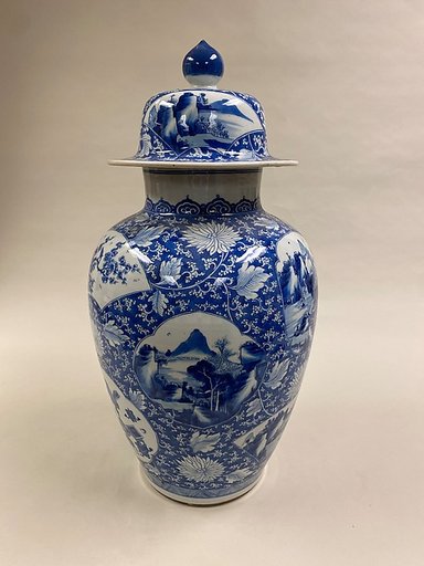 Covered jar with flowers