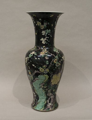 Vase with flowers and birds
