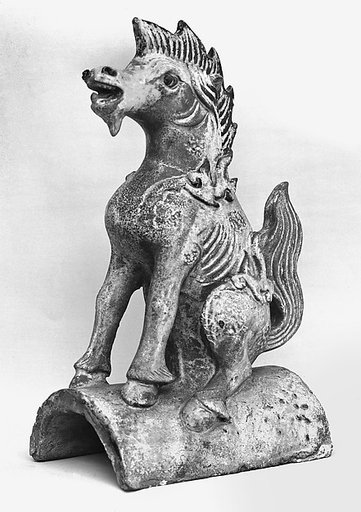 Roof tile with a mythical creature