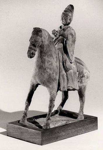 Official on Horseback