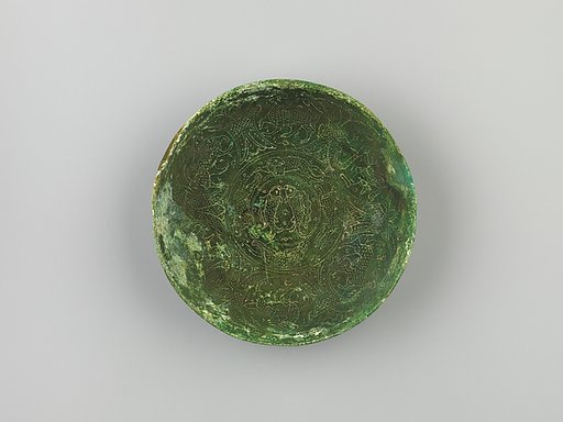 Bowl with double fish, dancers, and animals
