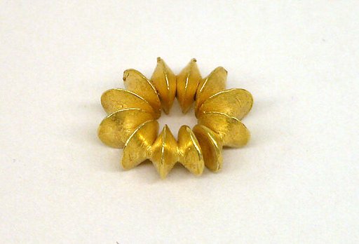 Ear Clip Composed of Fused Discs