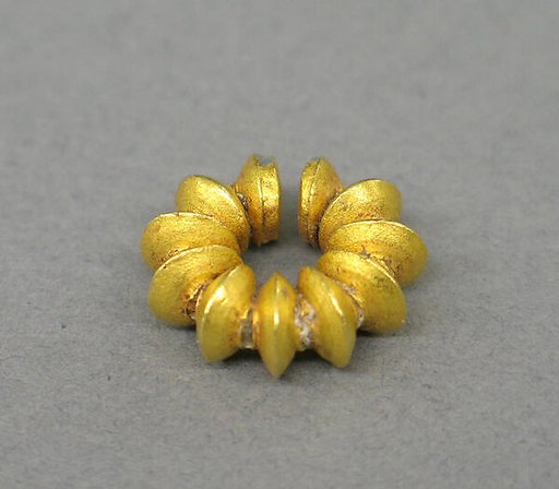 Ear Clip Composed of Fused Discs
